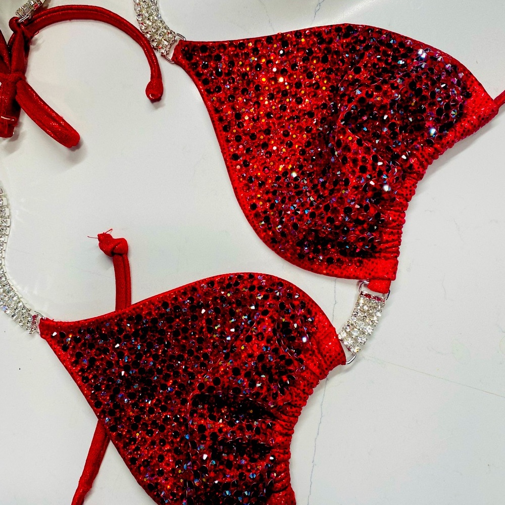 Toxic Angelz suit - holo red, xl top, pro cut bottoms. Room for adjustments.